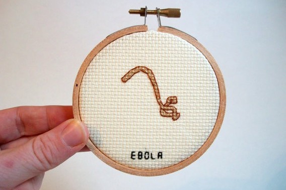 Декоративная вышивка с изображением Эболы