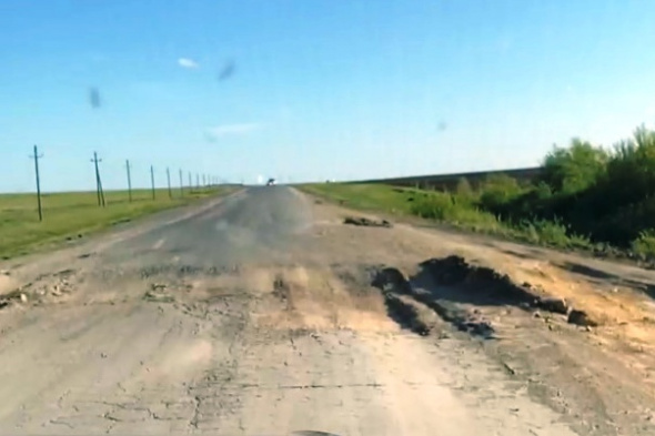 Бездорожье региональной трассы: Въезд в Оренбургскую область со стороны Башкирии практически развалился